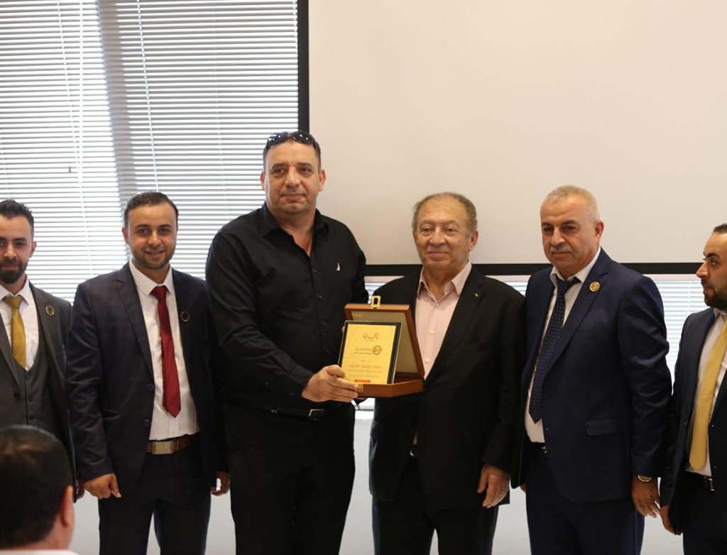 Mr. Muhammad Mansour received a plaque of appreciation.